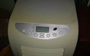 Climatiseur debout avec son tube d’évacuation